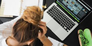 Woman stressed at computer